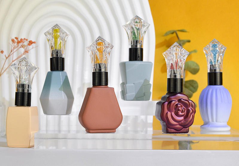 Brand perception contrast between 20mL luxury frosted glass nail polish bottle (premium retail display) and 5mL budget-friendly clear glass bottle (drugstore shelf)