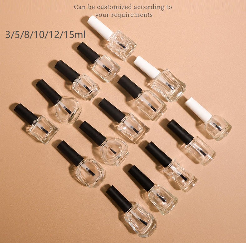 ssortment of standard and custom nail polish glass bottles in common sizes (5mL sample, 7mL gel, 15mL regular, 20mL luxury) displayed in a cosmetic packaging studio setting